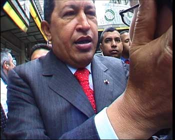 Hugo Chavez embracing Espe Espigares