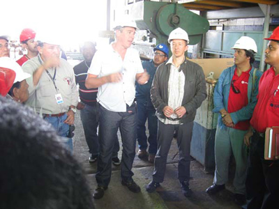Bruno Verlaeckt, president of AC Antwerpen speaking with workers in El Palito refinery